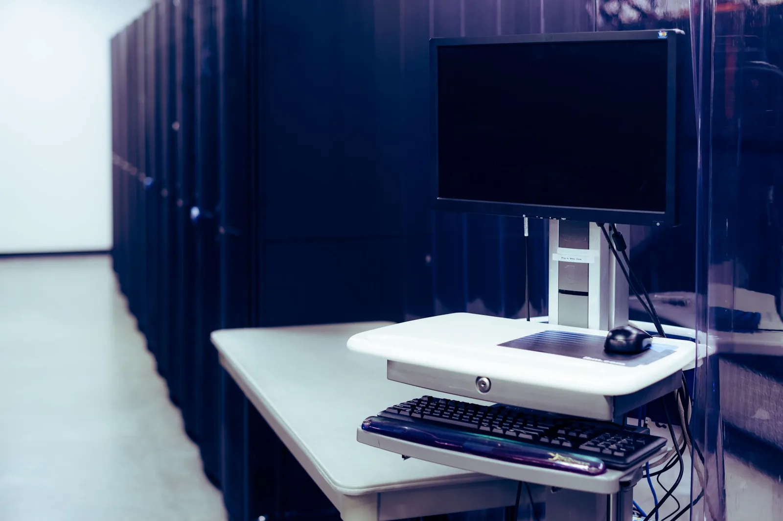 Rack of GPU servers in a datacenter powering self-hosted open-source LLM inference workloads