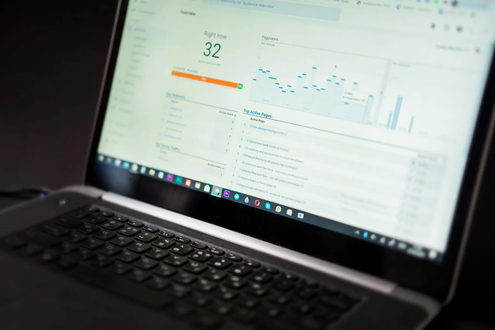 Developer monitoring cloud API cost dashboard on laptop while optimizing LLM token usage